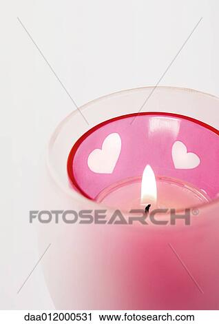 Candle burning in candle holder View Large Photo Image Stock Image - Candle burning in candle holder. Fotosearch
