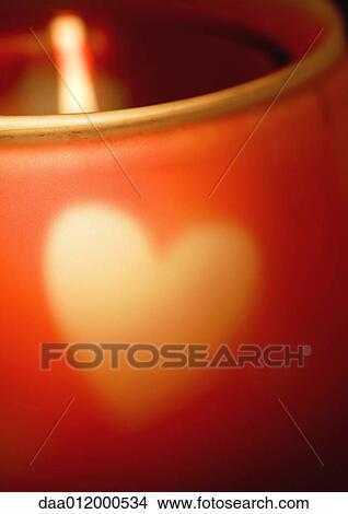 Candleholder with heart pattern, extreme close-up View Large Photo Image Picture - Candleholder with heart pattern, extreme close-up. Fotosearch