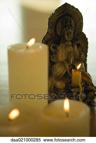 Candles and effigy View Large Photo Image Stock Photography - Candles and effigy. Fotosearch