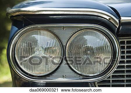 Stock Image - Car headlight. Fotosearch