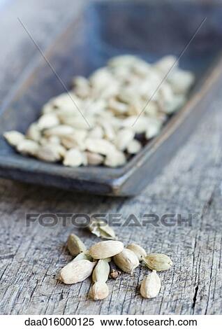 Cardamom seeds View Large Photo Image Stock Photography - Cardamom seeds. Fotosearch