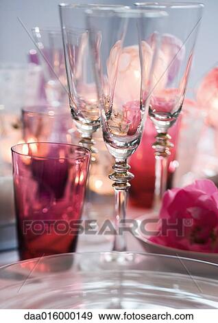 Stock Photo - Champagne glasses on set table. Fotosearch