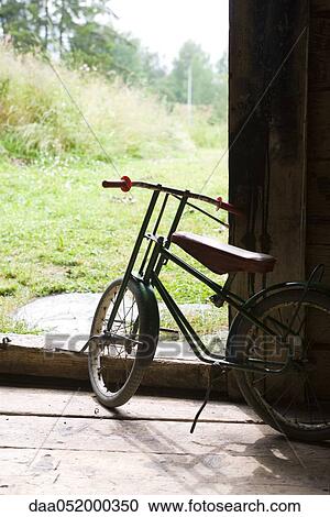 Child's bicycle stored in garage View Large Photo Image Stock Image - Child's bicycle stored in garage. Fotosearch