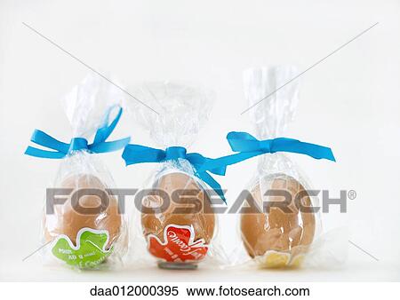 Stock Photography - Chocolate eggs in plastic wrappers. Fotosearch