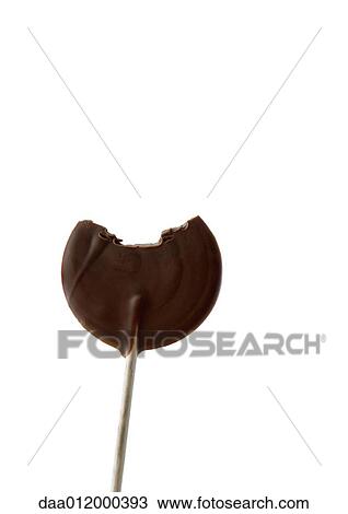 Chocolate lollipop with bite missing View Large Photo Image Stock Image - Chocolate lollipop with bite missing. Fotosearch