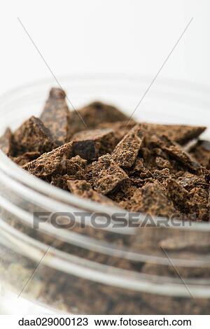 Chocolate shavings in small container View Large Photo Image Stock Image - Chocolate shavings in small container. Fotosearch
