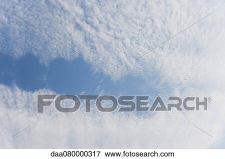 Stock Photo - Cirrostratus clouds. Fotosearch