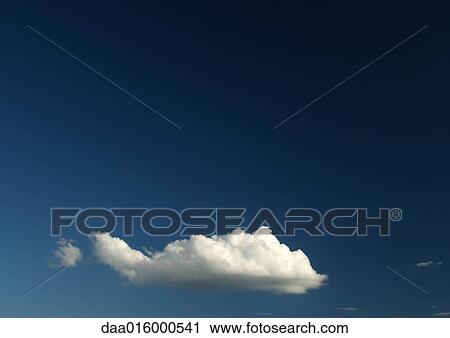 Stock Image - Cloud in blue sky. Fotosearch