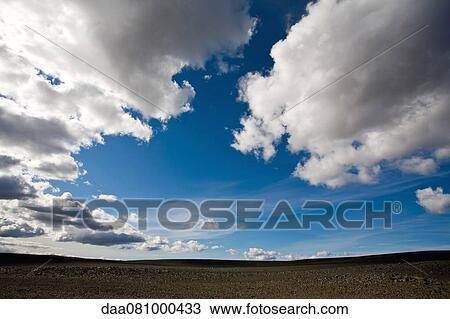 Clouds over barren landscape, Sprengisandur region, Iceland View Large Photo Image Stock Image - Clouds over barren landscape, Sprengisandur region, Iceland. Fotosearch