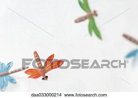 Colorful toy dragonflies, close-up View Large Photo Image Picture - Colorful toy dragonflies, close-up. Fotosearch