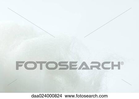 Cotton against white background, extreme close-up View Large Photo Image Picture - Cotton against white background, extreme close-up. Fotosearch