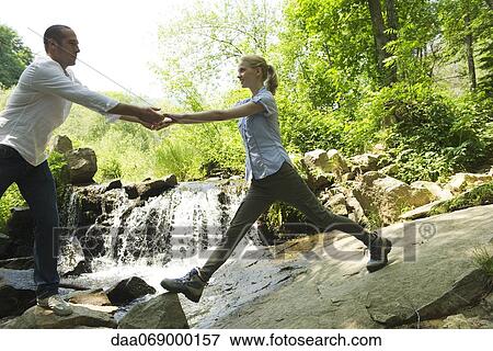 Couple hiking View Large Photo Image Stock Photo - Couple hiking. Fotosearch