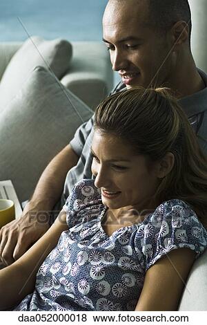 Stock Photo - Couple together at home. Fotosearch