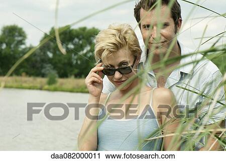 Couple together outdoors, portrait View Large Photo Image Stock Image - Couple together outdoors, portrait. Fotosearch
