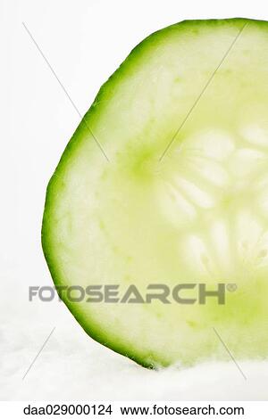 Cucumber slice View Large Photo Image Picture - Cucumber slice. Fotosearch