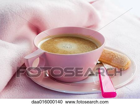 Cup of coffee on saucer with spoon and ladyfinger cookie View Large Photo Image Stock Image - Cup of coffee on saucer with spoon and ladyfinger cookie. Fotosearch