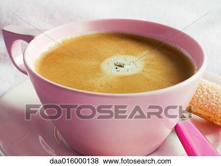 Cup of coffee on saucer with spoon and ladyfinger cookie View Large Photo Image Stock Photo - Cup of coffee on saucer with spoon and ladyfinger cookie. Fotosearch