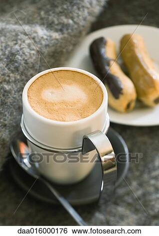 Cup of espresso and pastries View Large Photo Image Stock Photograph - Cup of espresso and pastries. Fotosearch