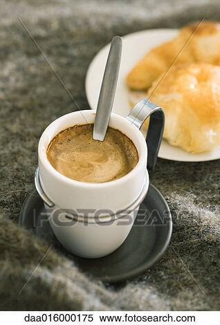Stock Photography - Cup of espresso and pastries. Fotosearch