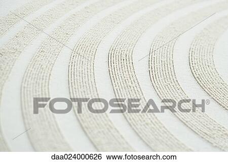 Curve pattern traced in sand, close-up View Large Photo Image Stock Photograph - Curve pattern traced in sand, close-up. Fotosearch