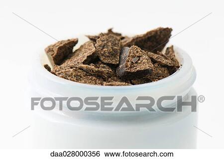 Dark chocolate in small cosmetic container, close-up View Large Photo Image Stock Photograph - Dark chocolate in small cosmetic container, close-up. Fotosearch