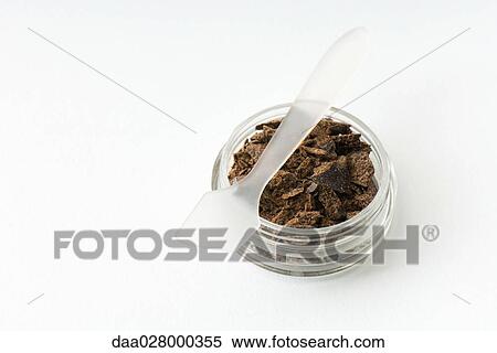Dark chocolate in small cosmetic container View Large Photo Image Stock Photography - Dark chocolate in small cosmetic container. Fotosearch