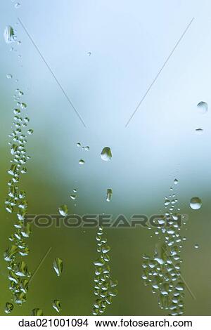Drops of condensation on window pane View Large Photo Image Picture - Drops of condensation on window pane. Fotosearch