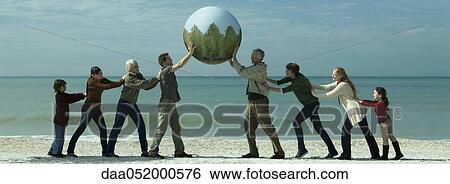 Ecology concept, group of people saving the earth together View Large Photo Image Stock Photograph - Ecology concept, group of people saving the earth together. Fotosearch
