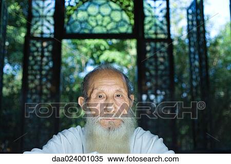 Elderly man with long beard, portrait View Large Photo Image Stock Photography - Elderly man with long beard, portrait. Fotosearch