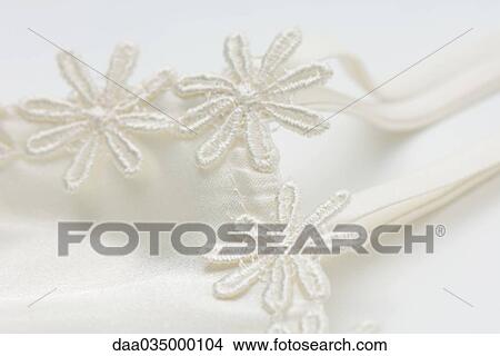 Embroidered flowers, close-up View Large Photo Image Picture - Embroidered flowers, close-up. Fotosearch