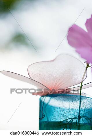 Fake butterfly on edge of glass View Large Photo Image Stock Photography - Fake butterfly on edge of glass. Fotosearch