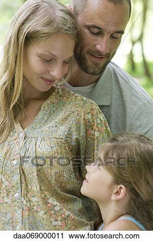 Family together outdoors, portrait View Large Photo Image Stock Image - Family together outdoors, portrait. Fotosearch