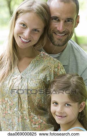 Stock Photography - Family together outdoors, portrait. Fotosearch