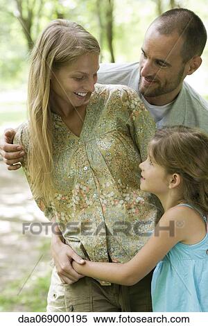 Family together outdoors View Large Photo Image Stock Photography - Family together outdoors. Fotosearch