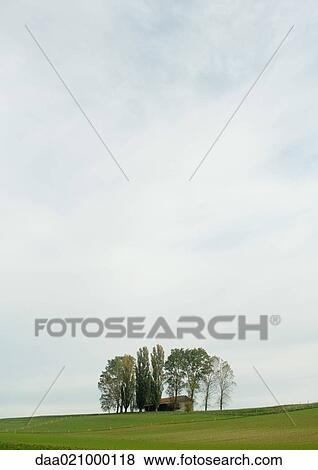 Farmhouse in green landscape View Large Photo Image Stock Photo - Farmhouse in green landscape. Fotosearch