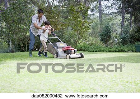 Father and son mowing lawn together View Large Photo Image Stock Image - Father and son mowing lawn together. Fotosearch