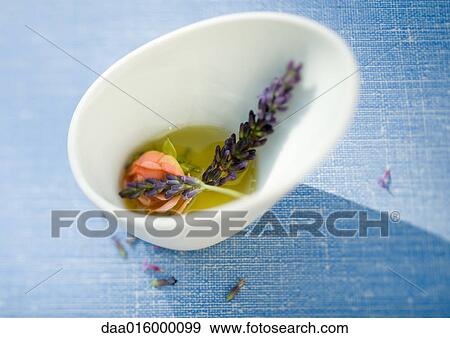 Flowers macerating in oil View Large Photo Image Stock Photo - Flowers macerating in oil. Fotosearch