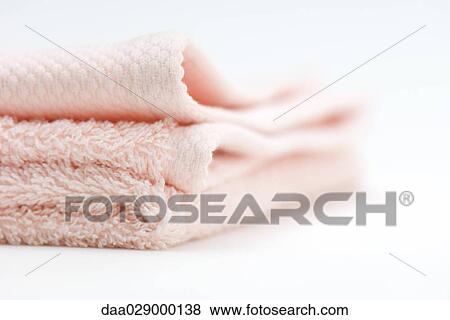 Stock Photo - Folded bath towel, close-up. Fotosearch