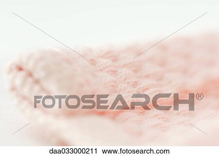 Stock Image - Folded blanket, close-up. Fotosearch