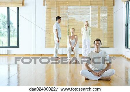 Four adults in various forms of meditation View Large Photo Image Stock Photo - Four adults in various forms of meditation. Fotosearch