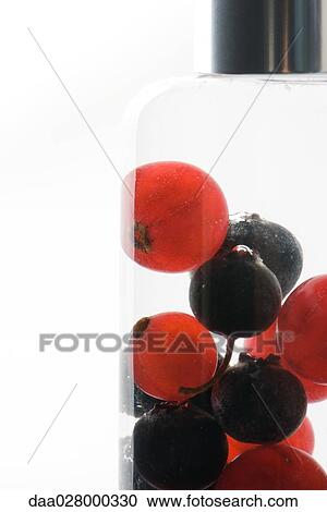 Fresh berries in cosmetic bottle View Large Photo Image Stock Image - Fresh berries in cosmetic bottle. Fotosearch