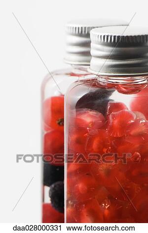 Fresh fruit in cosmetic bottles View Large Photo Image Stock Image - Fresh fruit in cosmetic bottles. Fotosearch