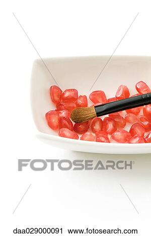 Fresh pomegranate seeds and make-up brush View Large Photo Image Stock Image - Fresh pomegranate seeds and make-up brush. Fotosearch