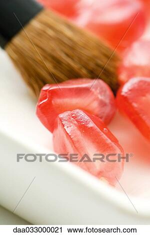 Fresh pomegranate seeds and make-up brush, extreme close-up View Large Photo Image Stock Image - Fresh pomegranate seeds and make-up brush, extreme close-up. Fotosearch