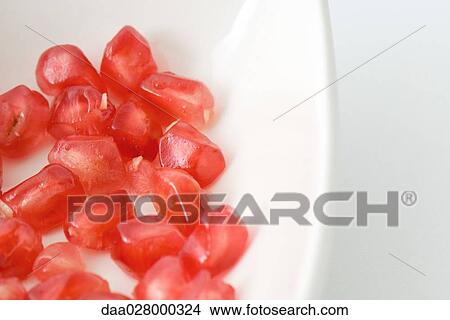 Picture - Fresh pomegranate seeds. Fotosearch