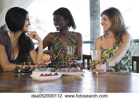 Stock Image - Friends spending time together. Fotosearch