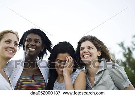 Friends together outdoors, portrait View Large Photo Image Stock Photo - Friends together outdoors, portrait. Fotosearch