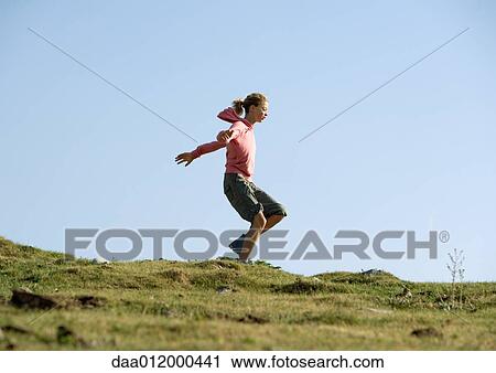 Stock Image - Girl running. Fotosearch