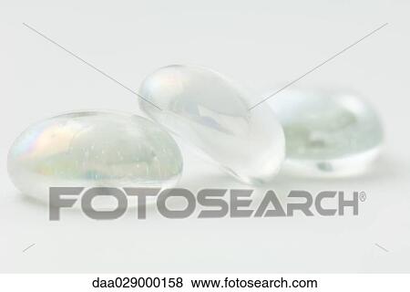 Stock Photo - Glass pebbles, close-up. Fotosearch