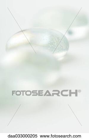 Stock Photography - Glass pebbles, close-up. Fotosearch